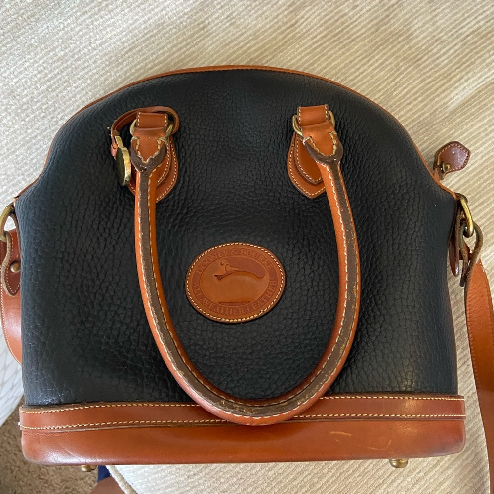 Dooney and Bourke Vintage purse with authentic tag. Mint condition.